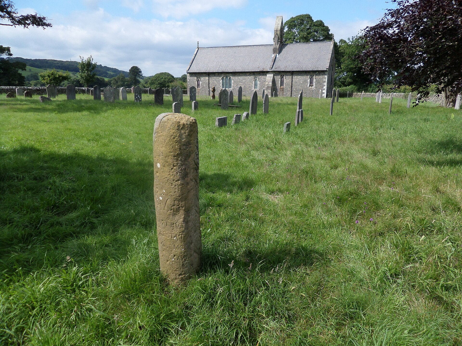 The Roman milestone at Middleton, Lonsdale, Cumbria, standing beside Holy Ghost Church